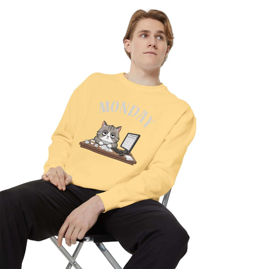 Monday Face Cat Stares Blankly Unisex Crewneck Sweatshirt in yellow with cat graphic and 'MONDAY' text.