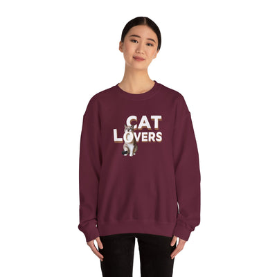 cat lovers cute kitten sweatshirt featuring a woman wearing a cozy sweater with a cat graphic.