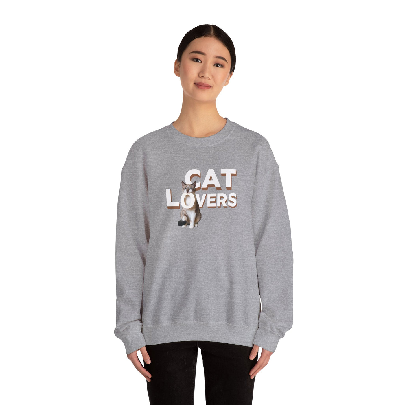 cat lovers cute kitten sweatshirt featuring a model wearing a gray crewneck with a cat graphic and 'CAT LOVERS' text.