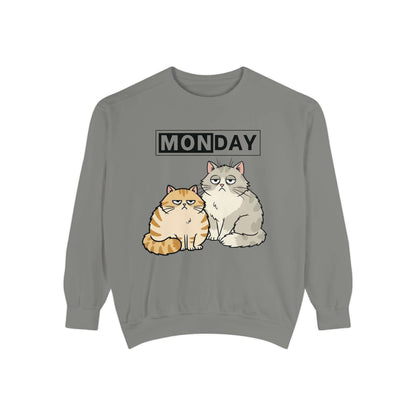 Monday Face Cat Stares Blankly Unisex Crewneck Sweatshirt features grumpy cats and 'MONDAY' text on a grey sweatshirt.