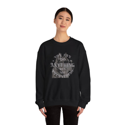 Cool dog graphic sweatshirt featuring the quote 'You can do anything but not everything' on a stylish crewneck.