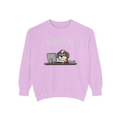 Monday Face Dog Stares Blankly Unisex Crewneck Sweatshirt on pastel pink background with dog at desk.