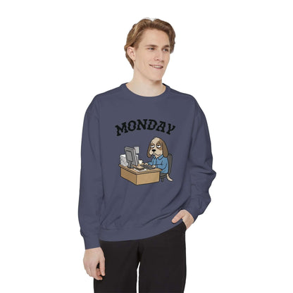 Monday Face Dog Stares Blankly Unisex Crewneck Sweatshirt features a cartoon dog at a desk under a 'MONDAY' banner.