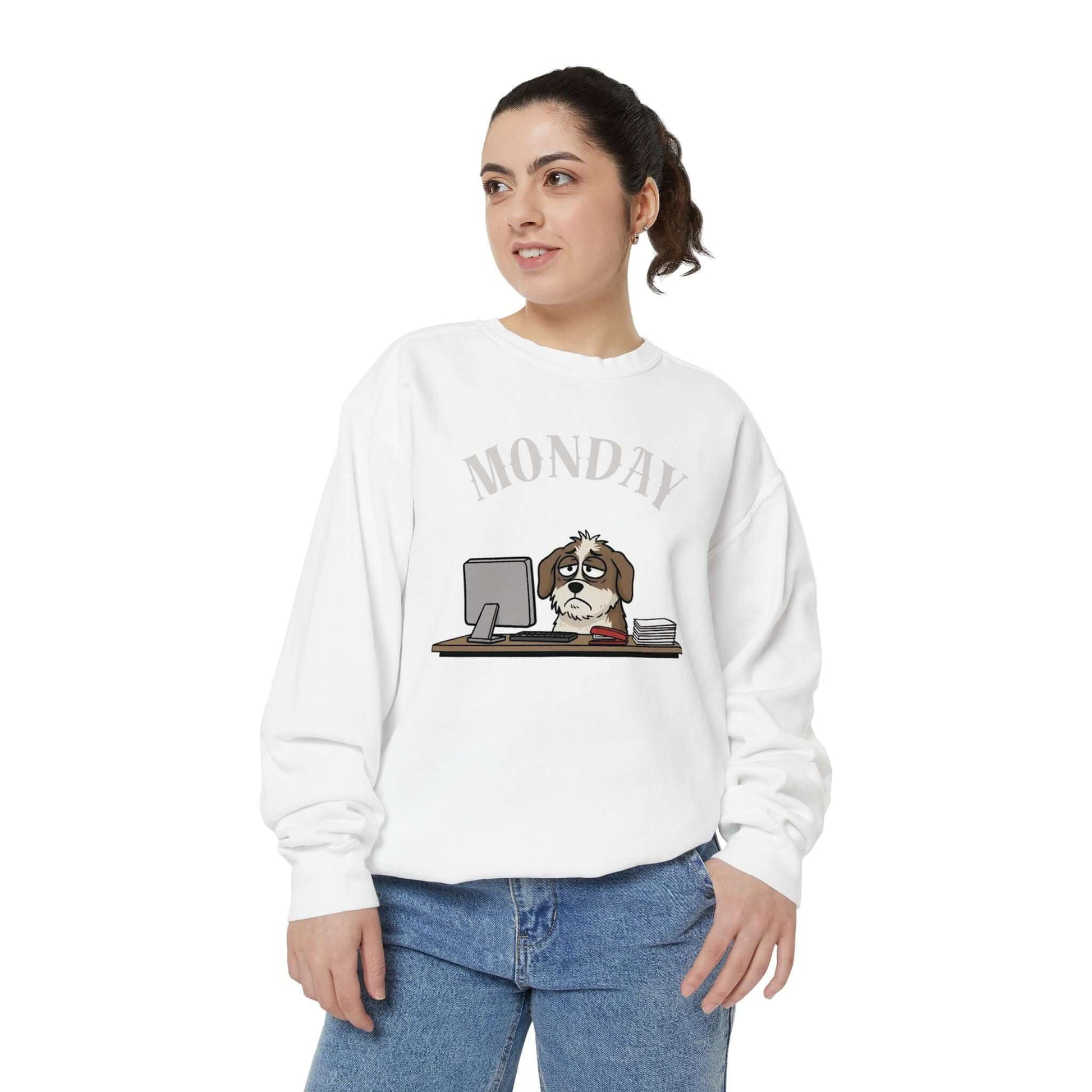 Monday Face Dog Stares Blankly Unisex Crewneck Sweatshirt featuring a dog at a desk under a 'MONDAY' banner.