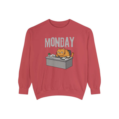 Monday Face Cat Stares Blankly Unisex Crewneck Sweatshirt featuring a cat at a desk with a "MONDAY" banner.