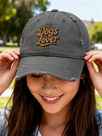 Dogs Lover Distressed Embroidered Cap Dad Hat Brown Words worn by a woman outdoors, featuring faded fabric and warm embroidery.