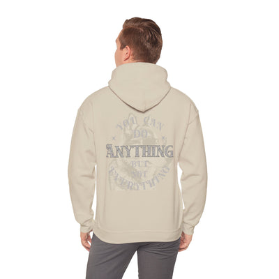 Man wearing Dog Lover plus Slogan on Back Unisex Pullover Hoodie with graphic on back.