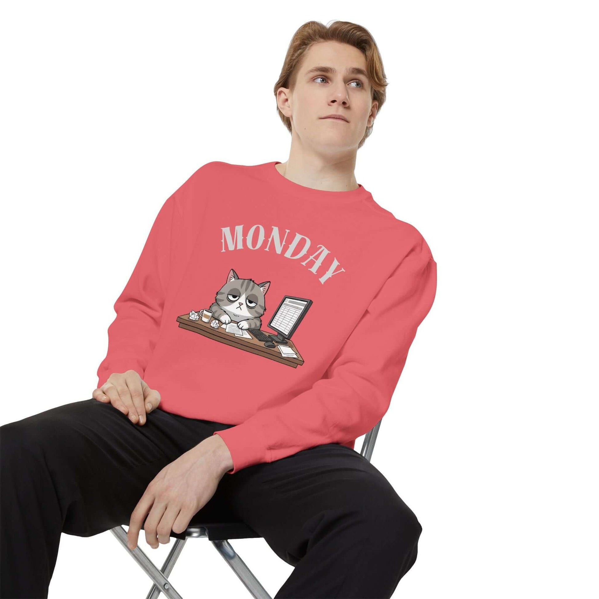 Monday Face Cat Stares Blankly Unisex Crewneck Sweatshirt in red featuring a grumpy cat and 'MONDAY' text.