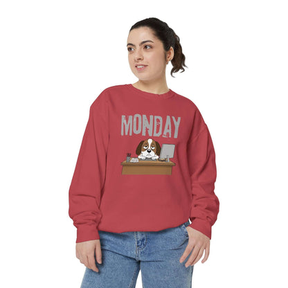 Monday Face Dog Stares Blankly Unisex Crewneck Sweatshirt in maroon worn by a woman with dog graphic on front.