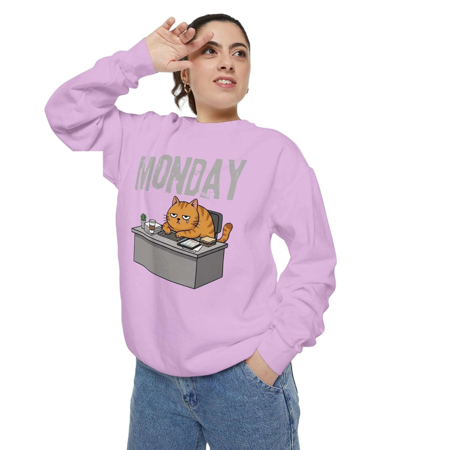 Monday Face Cat Stares Blankly Unisex Crewneck Sweatshirt in lavender color with cat design and 'MONDAY' text.