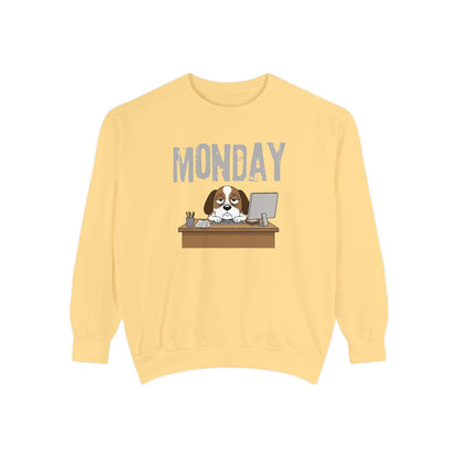 Monday Face Dog Stares Blankly Unisex Crewneck Sweatshirt with a cute dog at a desk and a "MONDAY" banner.
