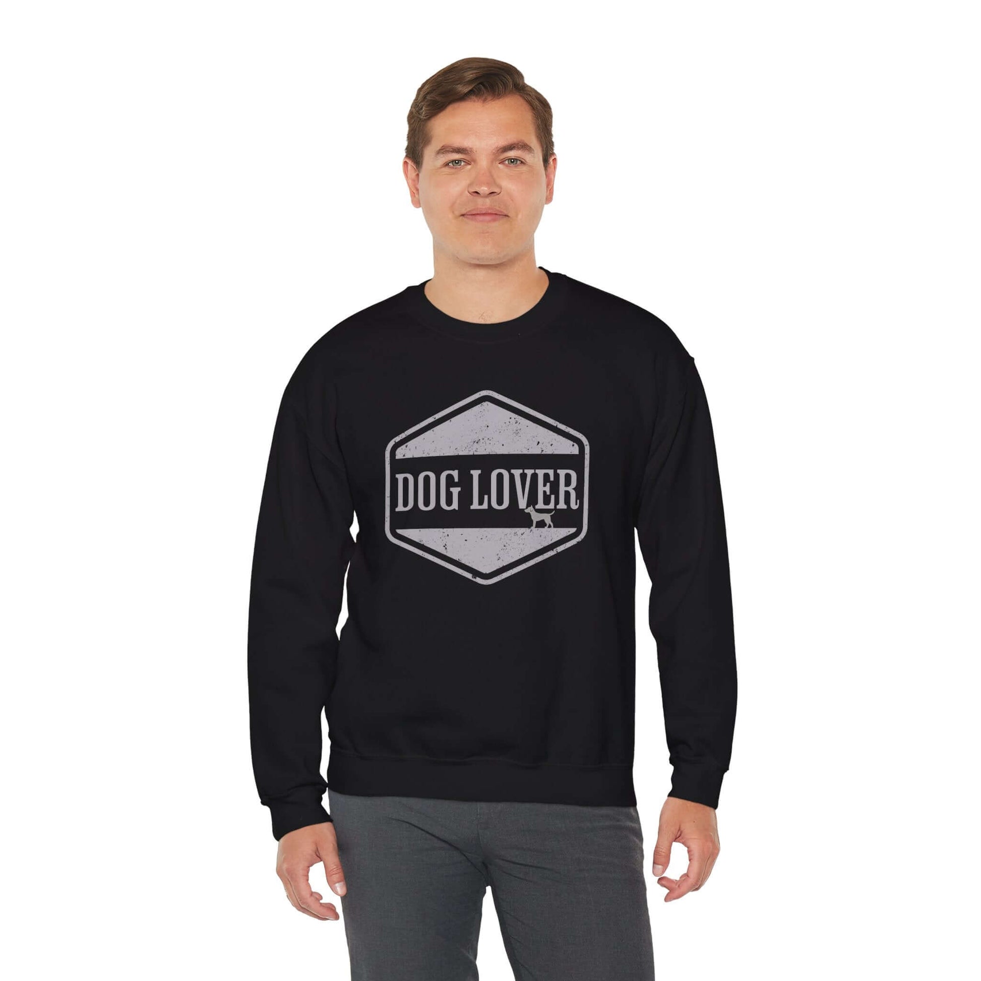 Dog Lover Vintage Badge Unisex Crewneck Sweatshirt displayed on a model, featuring a vintage-style badge design.