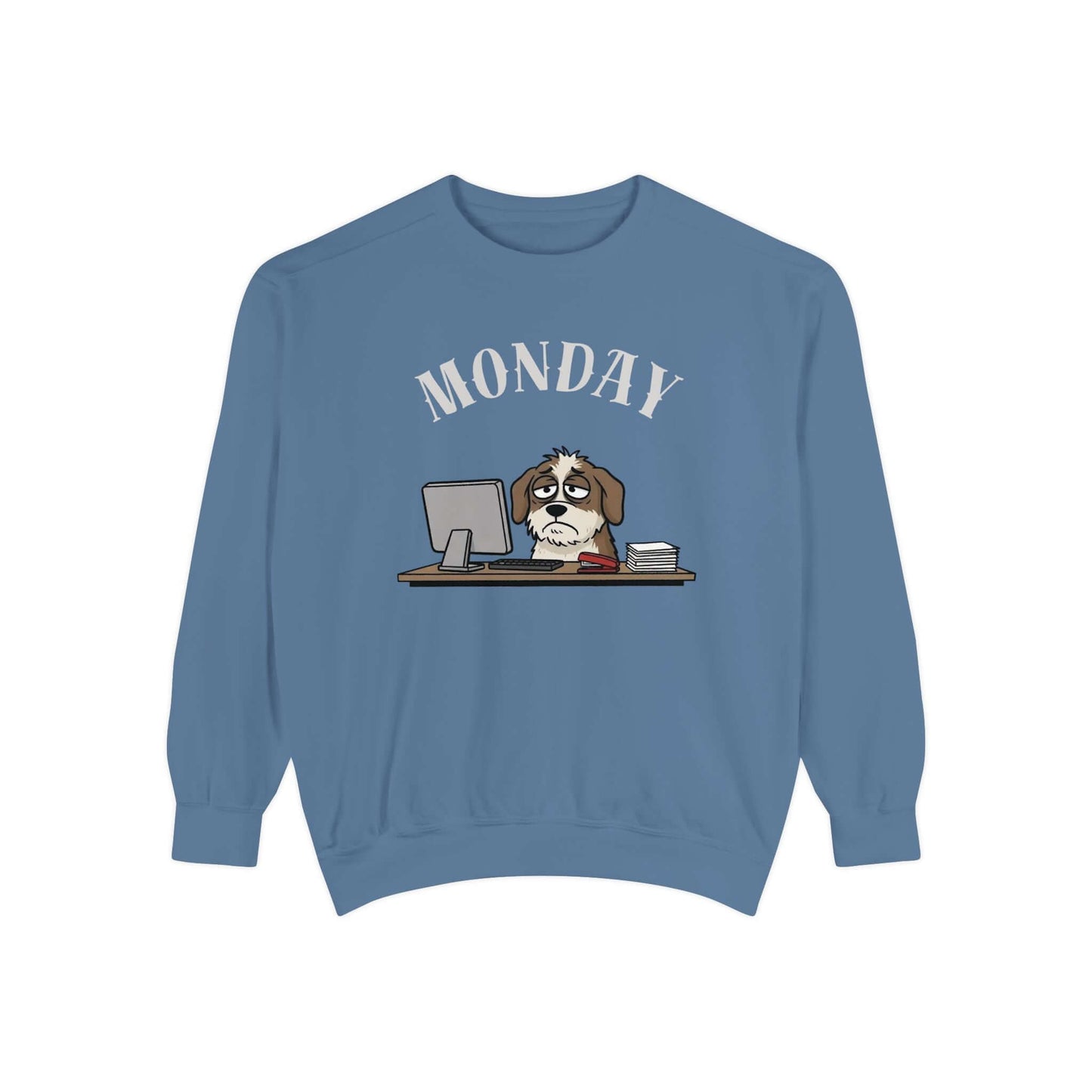 Monday Face Dog Stares Blankly Unisex Crewneck Sweatshirt on a blue background with a cartoon dog at a desk.