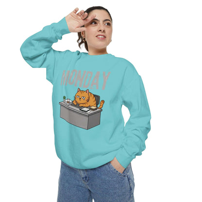 Monday Face Cat Stares Blankly Unisex Crewneck Sweatshirt with a cat sitting at a desk, perfect for casual wear.