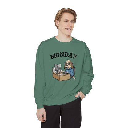 Monday Face Dog Stares Blankly Unisex Crewneck Sweatshirt featuring a cartoon dog at a desk under 'MONDAY' banner.