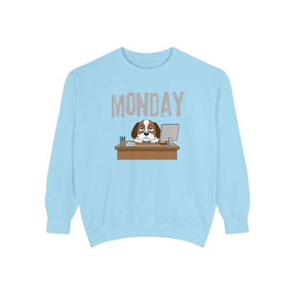 Monday Face Dog Stares Blankly Unisex Crewneck Sweatshirt in light blue with a dog at a desk under MONDAY banner.