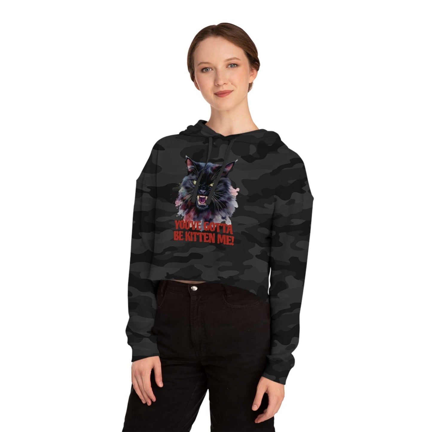 You've Gotta Be Kitten Me - Black Cat Women Cropped Hoodie on a model, featuring a playful cat graphic.