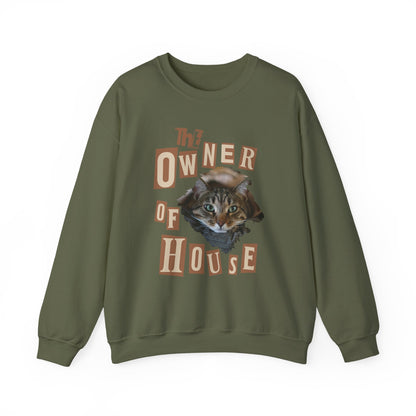 Cat is The Owner of House Unisex Crewneck Sweatshirt with cat graphic and vintage text design on olive green.