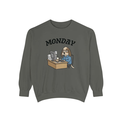 Monday Face Dog Stares Blankly Unisex Crewneck Sweatshirt featuring a dog at a desk under a 'MONDAY' banner.