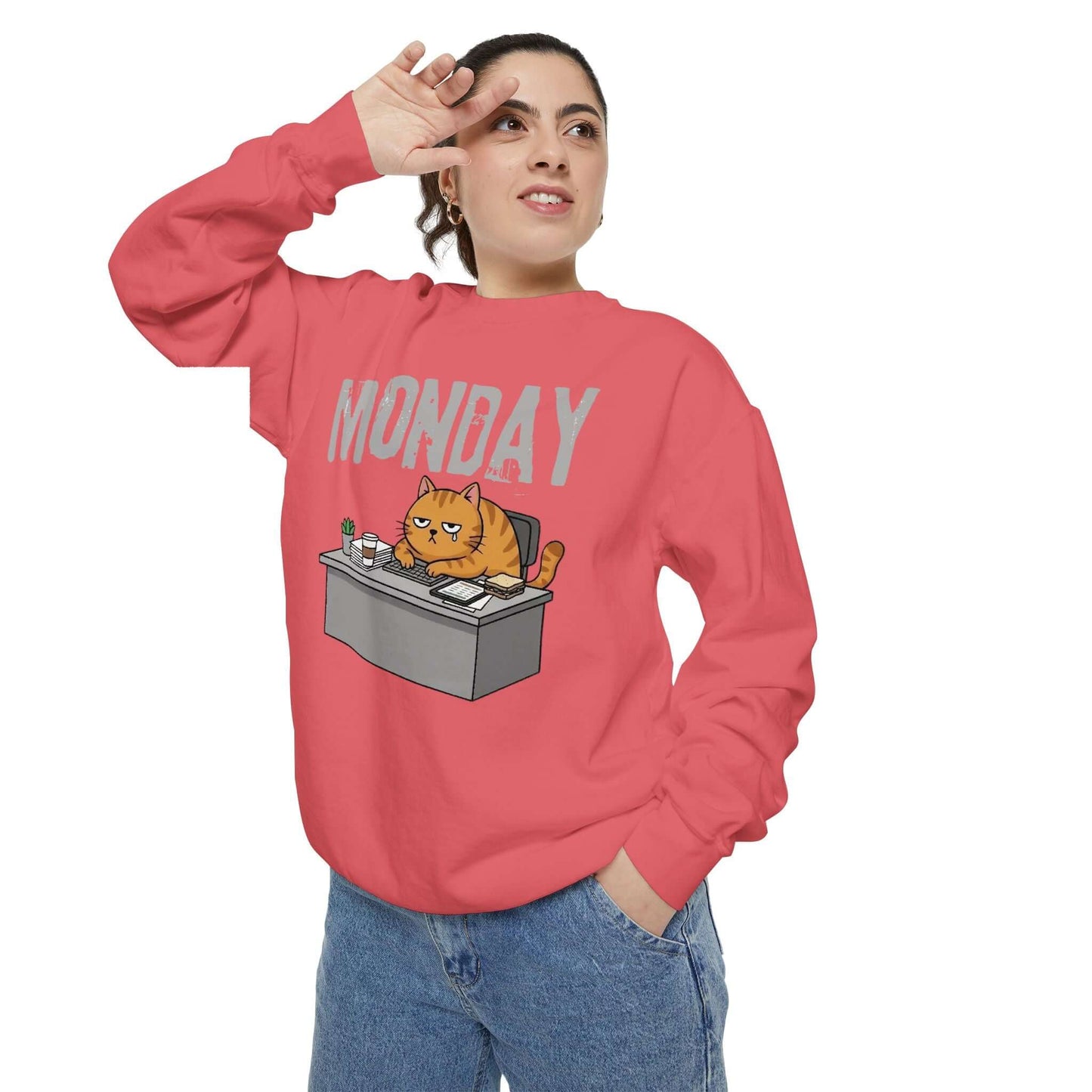 Monday Face Cat Stares Blankly Unisex Crewneck Sweatshirt worn by a person, featuring a cat illustration and 'MONDAY' text.